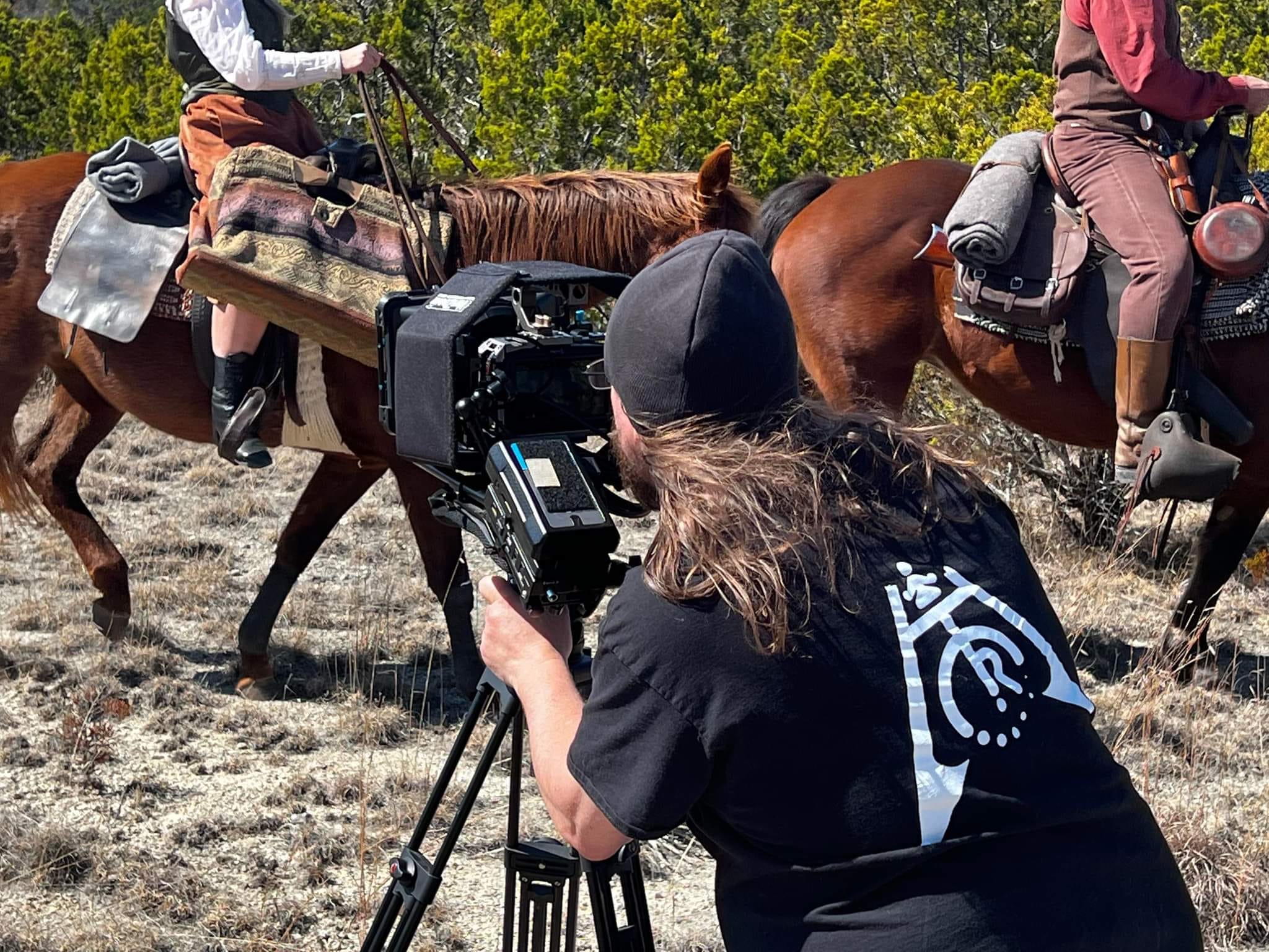 Shannon operating BlackMagic camera on set